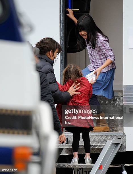 Actress Bailee Madison gives a Jersey Babys cd to Suri Cruise and Katie Holmes whilst filming on the set of horror film 'Don't Be Afraid Of The Dark'...