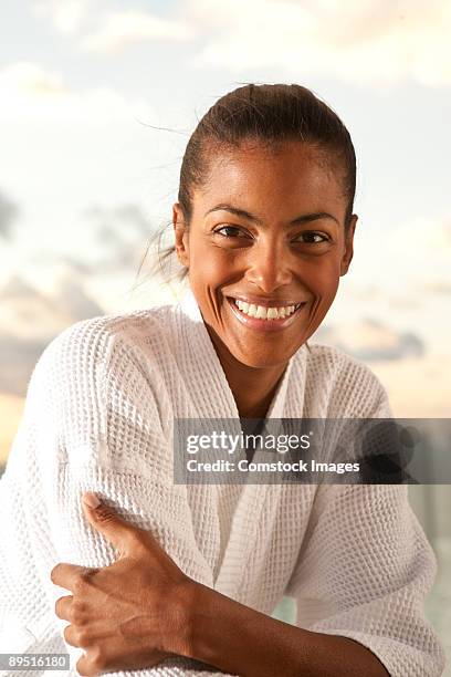 woman in bath robe - bath robe stockfoto's en -beelden