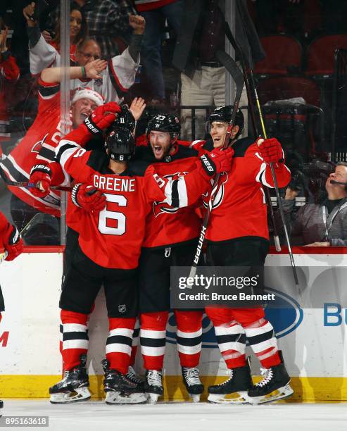 The New Jersey Devils celebrate a goal by Stefan Noesen at 15:53 of the third period against the Anaheim Ducks at the Prudential Center on December...