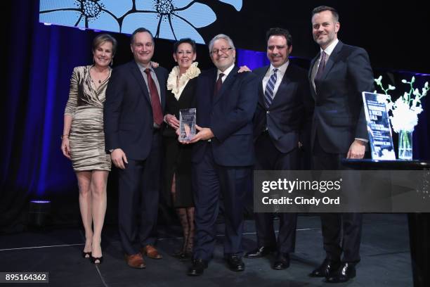 Lisa Truitt, Alexander Svezia, Christine Kurtz, Charlie Flateman, William Pennell, and Fred Dixon pose onstage at NYC & Company Foundation...