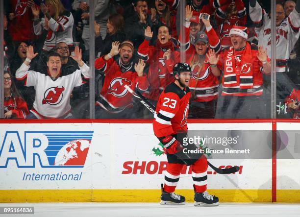 Stefan Noesen of the New Jersey Devils celebrates his empty net goal at 19:53 of the third period against the Anaheim Ducks at the Prudential Center...