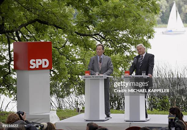 German Foreign Minister and Vice-Chancellor Frank-Walter Steinmeier and Social Democrats Party leader Franz Muentefering address a press conference...