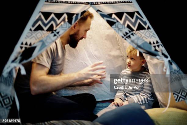 relaxed parenting - wigwam stock pictures, royalty-free photos & images