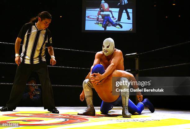 Mexican Lucha Libre Wrestler El Hijo Del Santo competes against Blue Demon Jr. At the Roundhouse in Camden on July 5, 2008 in London, England.