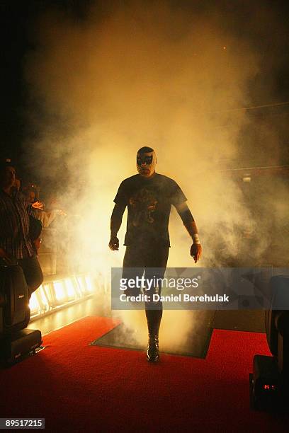 Mexican Lucha Libre Wrestler El Hijo De Cien Caras enters the arena at the Roundhouse in Camden on June 5, 2008 in London, England.