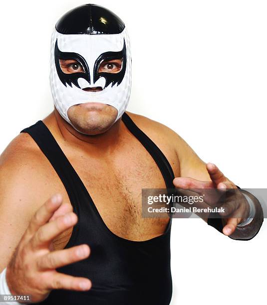 Mexican Lucha Libre Wrestler El Hijo De Cien Caras poses for a portrait at the Roundhouse in Camden on June 5, 2008 in London, England.