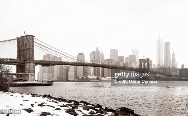 new york city after snowstorm - brooklyn bridge winter stock pictures, royalty-free photos & images