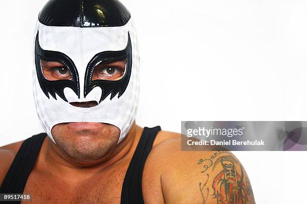 Mexican Lucha Libre Wrestler El Hijo De Cien Caras poses for a portrait at the Roundhouse in Camden on June 5, 2008 in London, England.