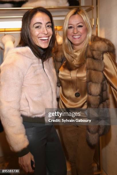 Natacha Minniti and Marigay McKee attend A night of Holiday cheer - Benefit cocktail party hosted by Thomas Salomon and Marigay McKee for the local...