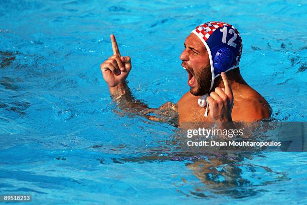 Paulo Obradovic of Croatia celebrates a goal in the Men's Water Polo semifinall match between Croatia nd Serbia at the 13th FINA World Championships...