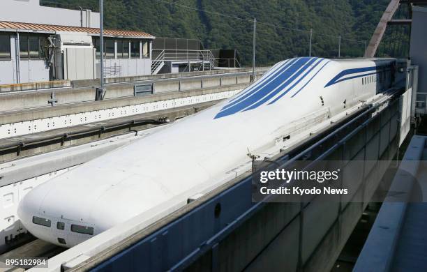 Photo taken in September 2014 shows a magnetically levitated train that is used for testing. A maglev train service will start between Tokyo's...