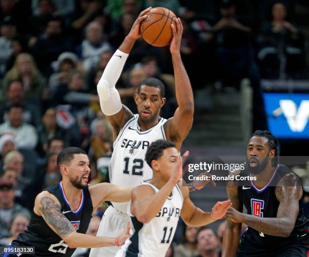 LaMarcus Aldridge of the San Antonio Spurs looks for the open man against the Los Angeles Clippers at AT&T Center on December 18, 2017 in San...