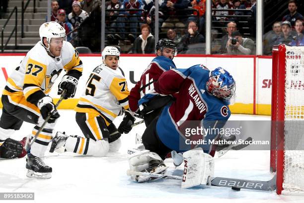 Goalie Semyon Varlamov of the Colorado Avalanche saves a shot on goal in the third period by Carter Rowney of the Pittsburgh Penguins at the Pepsi...