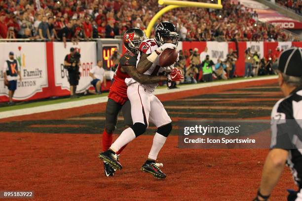 Justin Hardy of the Falcons makes the catch for the touchdown as Ryan Smith of the Bucs defends on the play during the regular season game between...