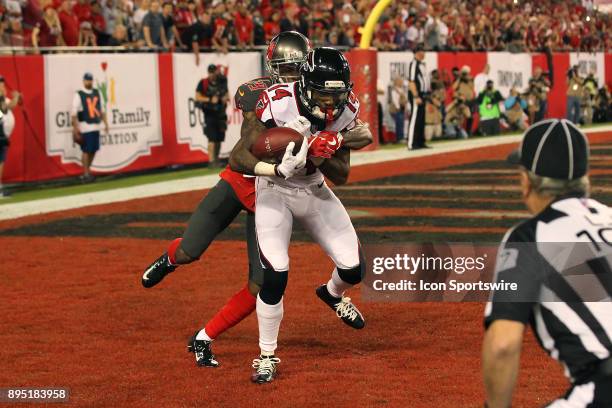 Justin Hardy of the Falcons makes the catch for the touchdown as Ryan Smith of the Bucs defends on the play during the regular season game between...