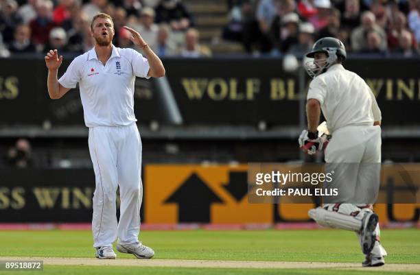 England bowler Andrew Flintoff reacts as Australian batsman Shane Watson adds runs on the first day of the third Ashes cricket test between England...