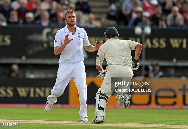 England bowler Andrew Flintoff avoids Australian batsman Shane Watson on the first day of the third Ashes cricket test between England and Australia...