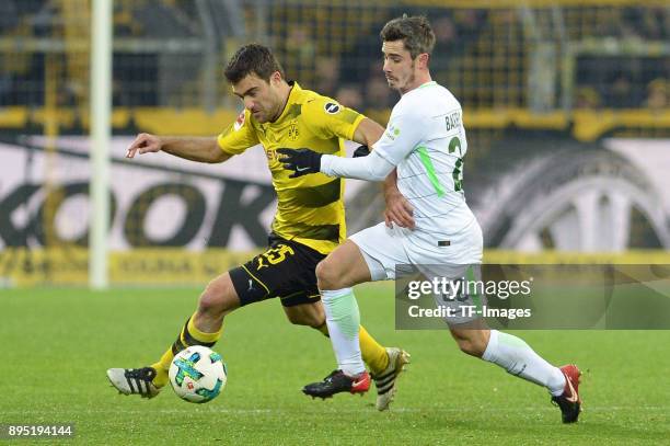 Sokratis Papastathopoulos of Dortmund and Fin Bartels of Bremen battle for the ball during the Bundesliga match between Borussia Dortmund and SV...