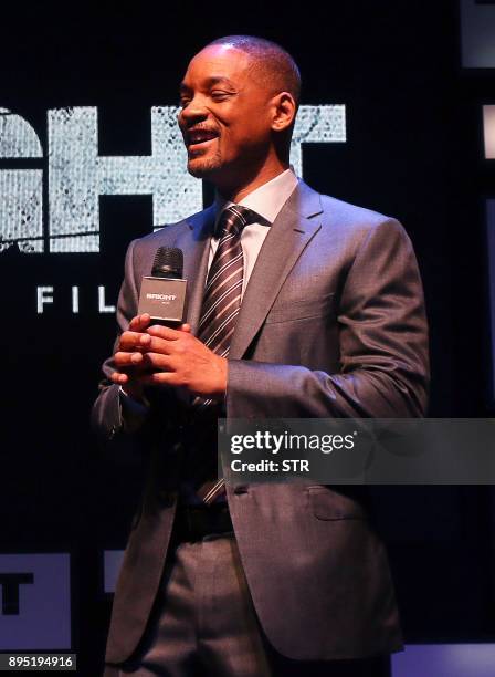 American Hollywood actor and producer Will Smith attends the premier of his cop thriller movie 'Bright' in Mumbai on December 18, 2017. / AFP PHOTO /...