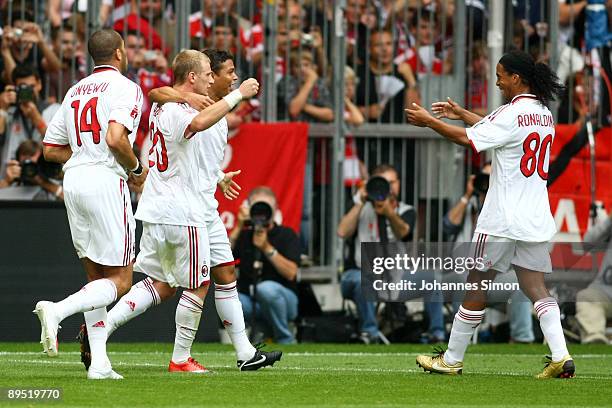 Thiago Silva of Milan celebrates with his teammates after scoring 1-0 during the Audi Cup tournament final match for the third place Boca Juniors v...