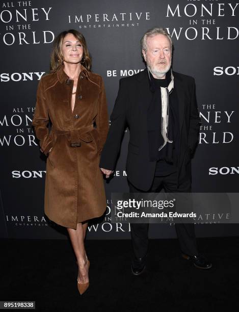 Director Ridley Scott and actress Giannina Facio arrive at the premiere of Sony Pictures Entertainment's "All The Money In The World" at the Samuel...