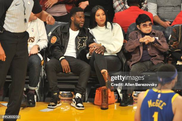 Kevin Hart and Eniko Parrish attend a basketball game between the Los Angeles Lakers and the Golden State Warriors at Staples Center on December 18,...