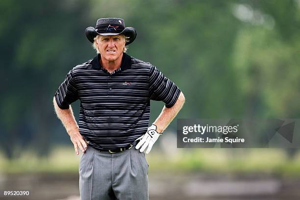 Greg Norman of Australia prepares to hit his 2nd shot on the 18th hole during the first round of the 2009 U.S. Senior Open at Crooked Stick Golf Club...