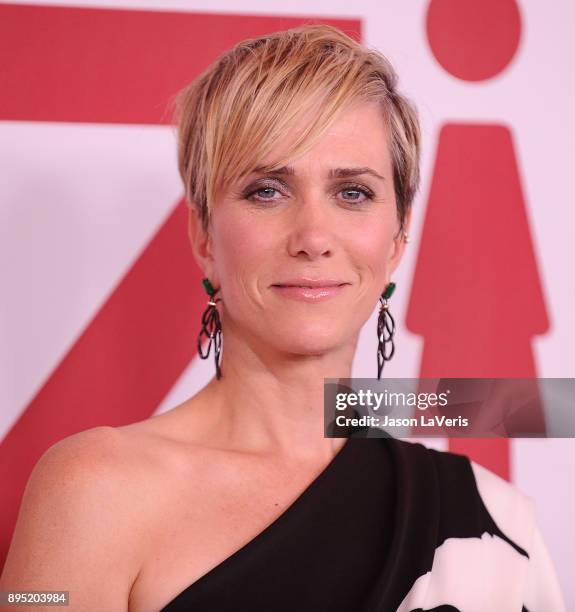 Actress Kristen Wiig attends the premiere of "Downsizing" at Regency Village Theatre on December 18, 2017 in Westwood, California.