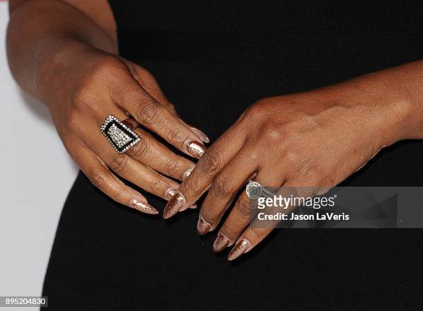 Actress Niecy Nash, jewelry and nail detail, attends the premiere of "Downsizing" at Regency Village Theatre on December 18, 2017 in Westwood,...