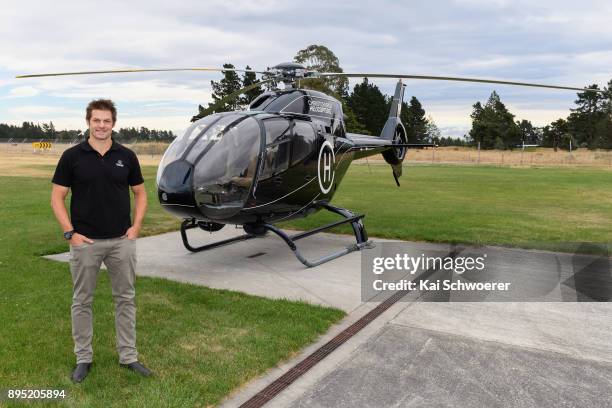 Former All Blacks captain Richie McCaw poses in front of a helicopter on his way to a Queens Baton Relay event on December 19, 2017 in Christchurch,...