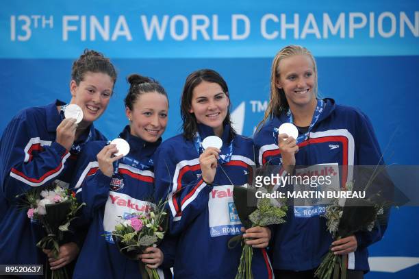 The US team, Dana Vollmer, Lacey Nymeyer, Ariana Kukors and Allison Schmitt celebrate their silver medal on the women's 4x200m freestyle final on...