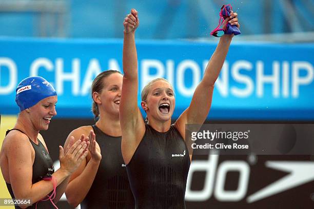 Joanne Jackson , Jazmin Carlin and Caitlin Mcclatchey cheer on Rebecca Adlington during the Women's 4x 200m Freestyle Final during the 13th FINA...