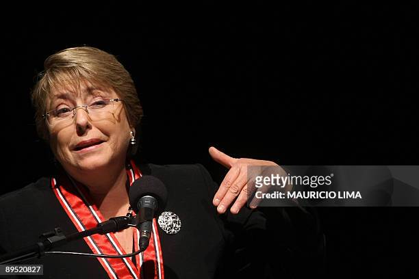 Chile's President Michelle Bachelet delivers a speech during a meeting with Brazil's President Luiz Inacio Lula da Silva and businessmen, at Sao...