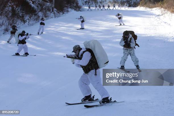 Marines from 3rd Marine Expeditionary force deployed from Okinawa, Japan, participate in the winter military training exercise with South Korean...