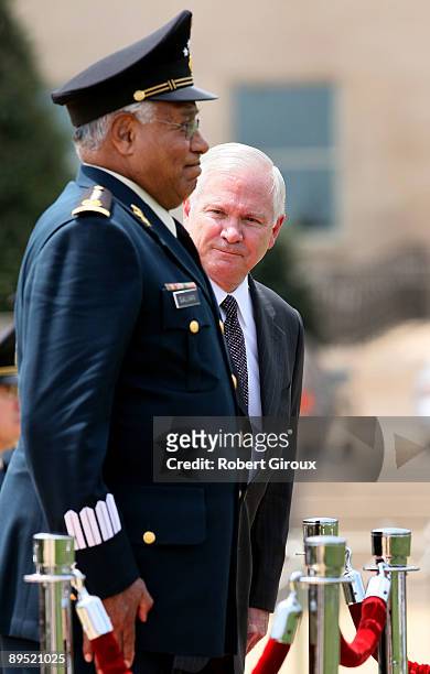 Secretary of Defense Robert M. Gates and Mexico's Secretary of National Defense Gen. Guillermo Galvan inspect the troops at the Pentagon July 30,...