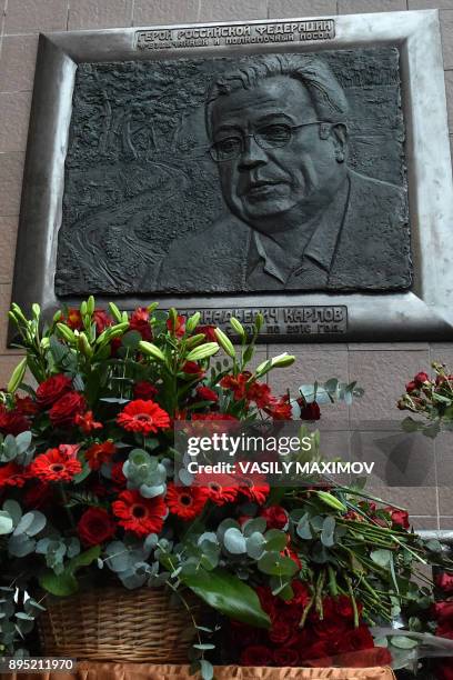 Picture taken on December 19, 2017 in Moscow shows a commemorative plaque in memory of slain Russia's ambassador to Turkey Andrei Karlov. - The...