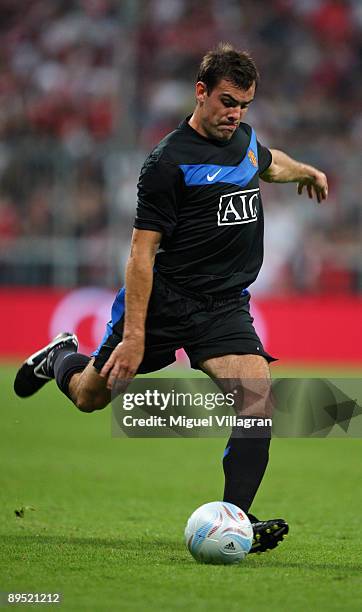 Michael Owen of Manchester plays the ball during the Audi Cup tournament match between FC Bayern Muenchen v Manchester United at Allianz Arena on...