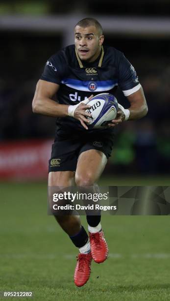 Jonathan Joseph of Bath runs with the ball during the European Rugby Champions Cup match between Bath Rugby and RC Toulon at the Recreation Ground on...