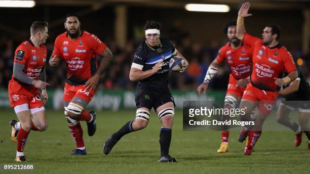 Francois Louw of Bath runs with the ball during the European Rugby Champions Cup match between Bath Rugby and RC Toulon at the Recreation Ground on...