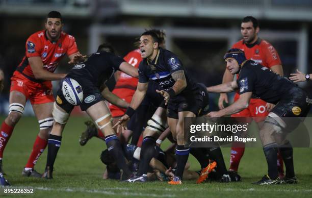 Kahn Fotuali'i of Bath passes the ball during the European Rugby Champions Cup match between Bath Rugby and RC Toulon at the Recreation Ground on...