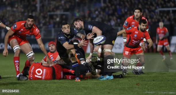 Kahn Fotuali'i of Bath passes the ball during the European Rugby Champions Cup match between Bath Rugby and RC Toulon at the Recreation Ground on...
