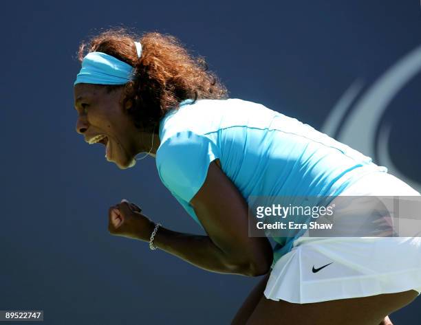Serena Williams of the USA celebrates winning a point in the second set tie breaker of her match against Melinda Czink of Hungary on Day 4 of the...