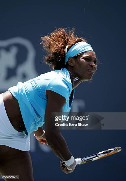 Serena Williams of the USA serves to Melinda Czink of Hungary during their match on Day 4 of the Bank of the West Classic at Stanford University on...
