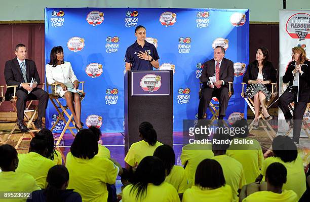 Candice Dupree of the Chicago Sky speaks while Ron Huberman, CEO of the Chicago Public Schools,Dr. Joyce Cooper, Hirsch Metropolitan High School...