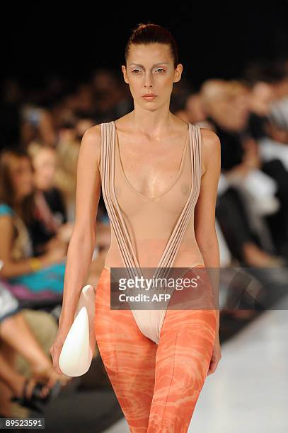 Model presents a creation by Peruvian designer Andrea Llosa during the Colombiamoda fashion show on July 30 in Medellin, Antioquia department,...