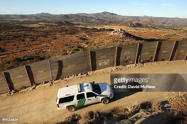 Border Patrol agents carry out special operations near the US-Mexico border fence following the first fatal shooting of a US Border Patrol agent in...