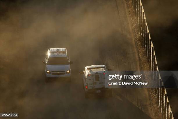 Border Patrol agents carry out special operations near the US-Mexico border fence following the first fatal shooting of a US Border Patrol agent in...