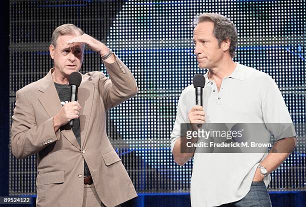 President and General Manager of Discovery Channel John Ford and Mike Rowe of the television show 'Dirty Jobs' speak during the Cable portion of the...