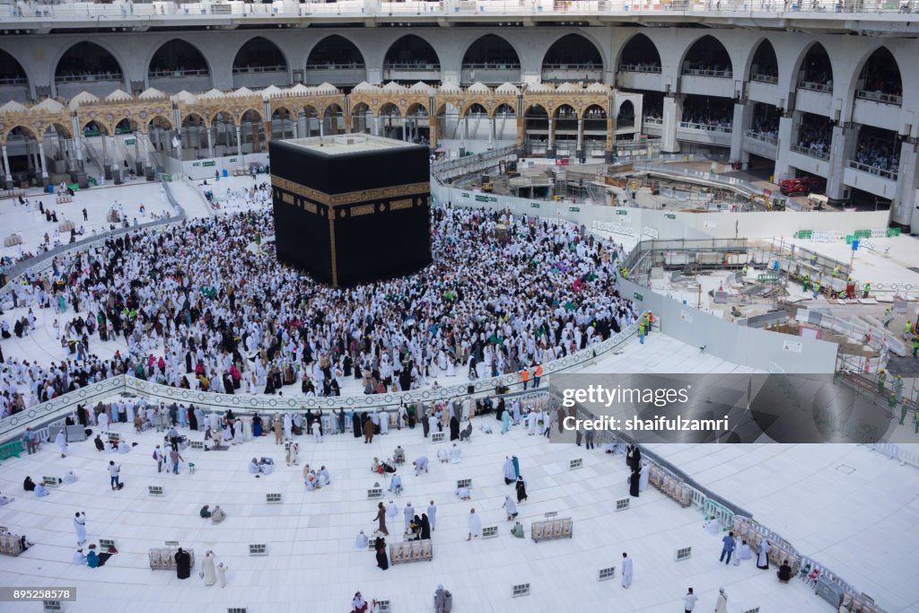 Muslim pilgrims circumambulate or "tawaf" the Kaabah after Subuh Prayer at Masjidil Haram