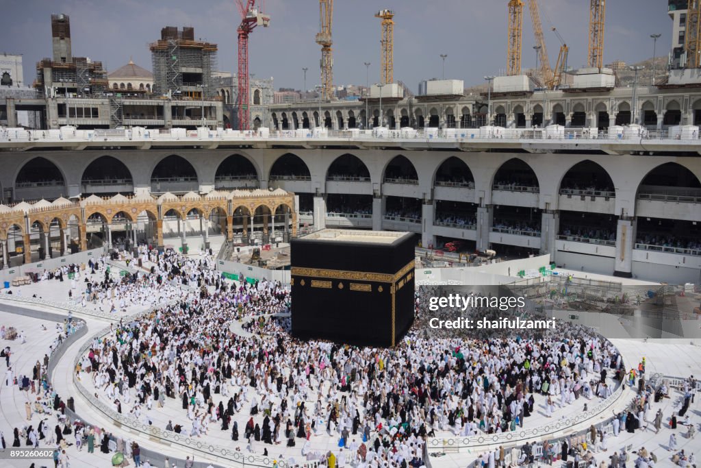 Muslim pilgrims circumambulate or "tawaf" the Kaabah after Subuh Prayer at Masjidil Haram